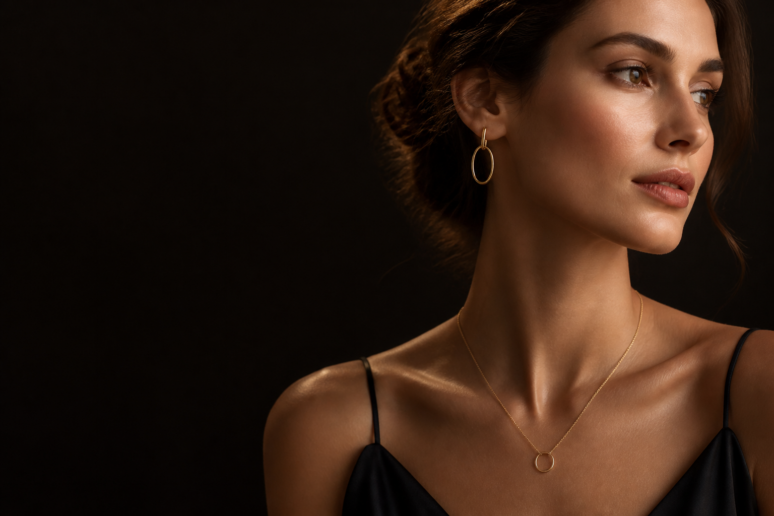 GOLDEEGA™ Fine Jewelry editorial image featuring gold and moissanite pieces